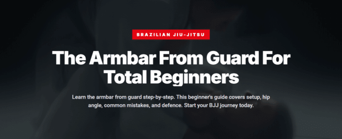 BJJ practitioner executing armbar from guard on training mats