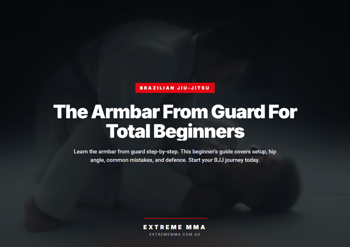 BJJ practitioner executing armbar from guard on training mats