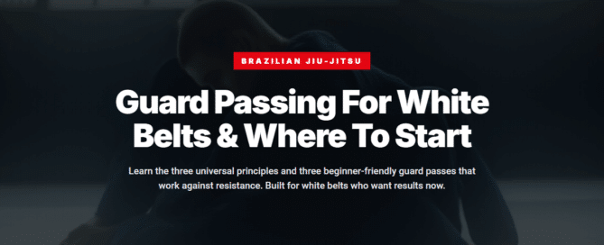 White belt performing knee cut guard pass during BJJ training
