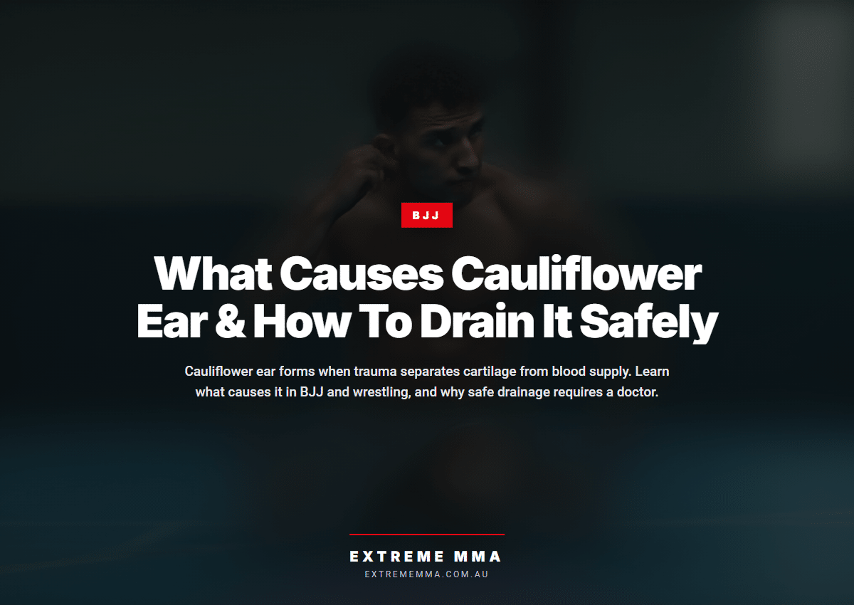 Wrestler checking ear for cauliflower ear injury after grappling training session