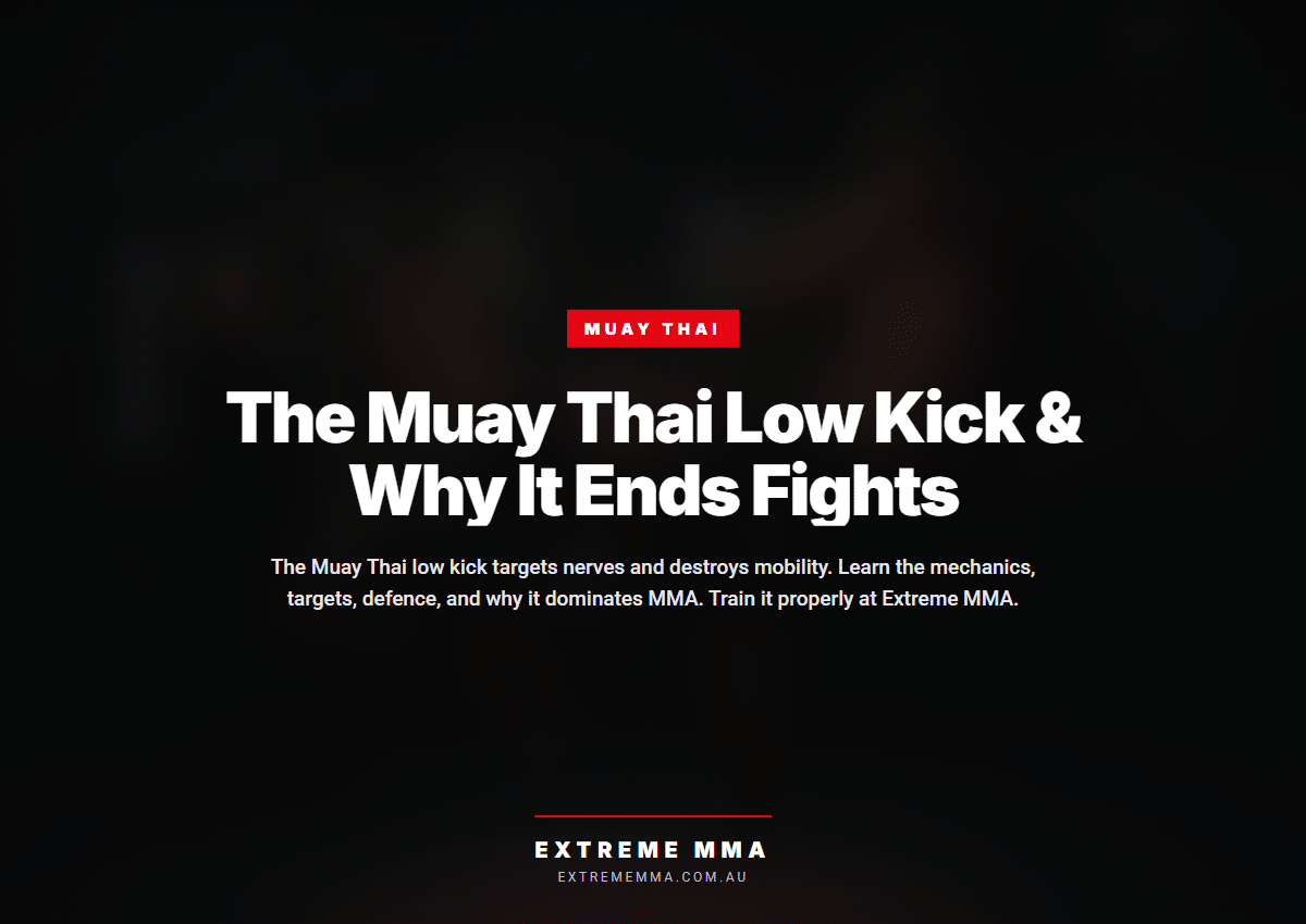 Muay Thai fighter throwing a low kick at heavy bag in training gym